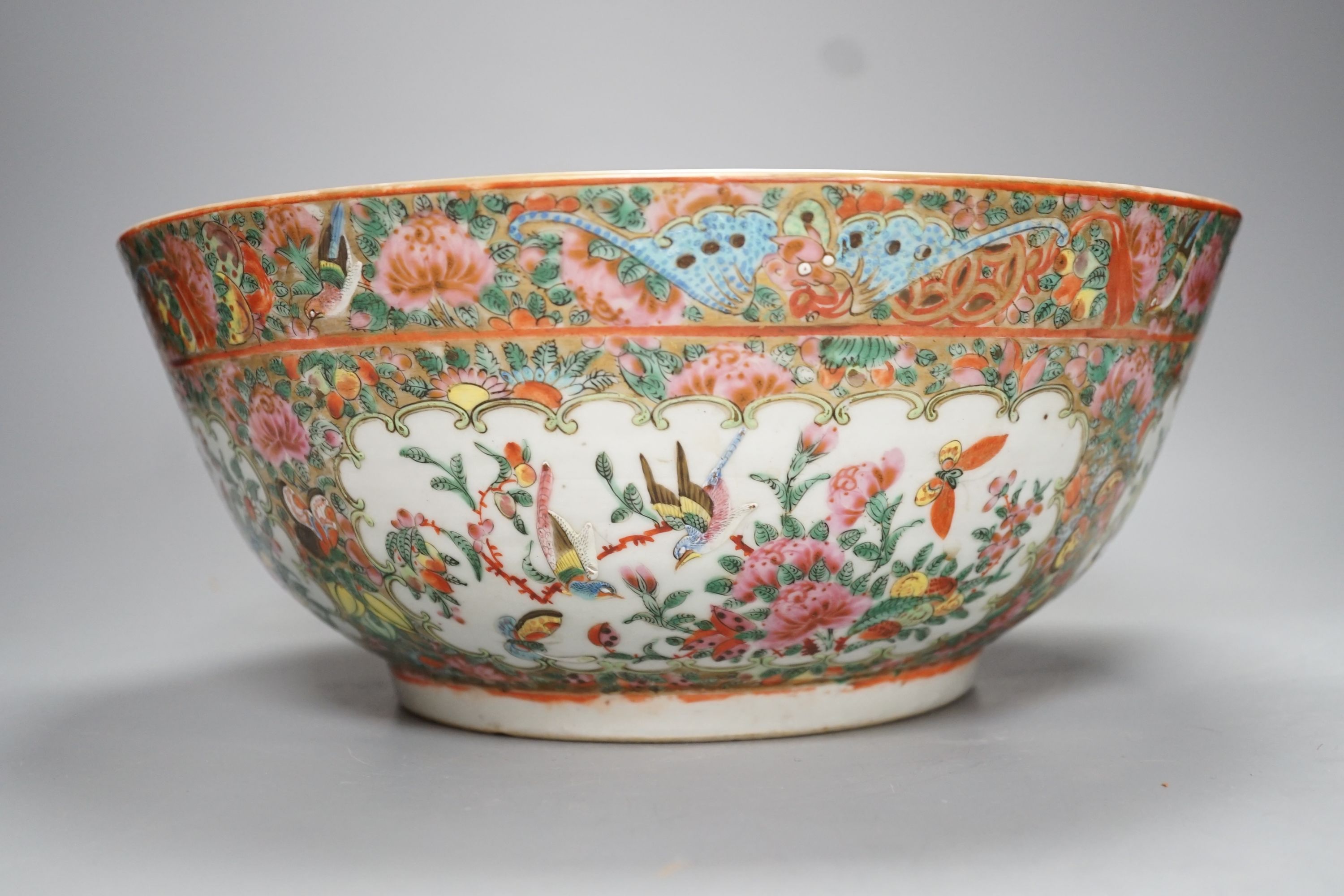 A late 19th century Chinese famille rose punch bowl - 29cm diameter